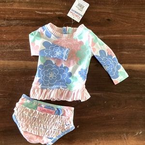 Ruffle Butt’s Swimsuit “pastel petals” size 6-12 months